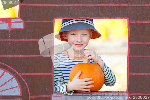 Image of kid at pumpkin patch