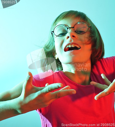 Image of adorable cute child lit with color light