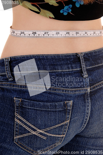 Image of Woman measuring waist.