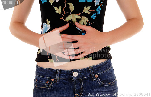Image of Woman holding her stomach.