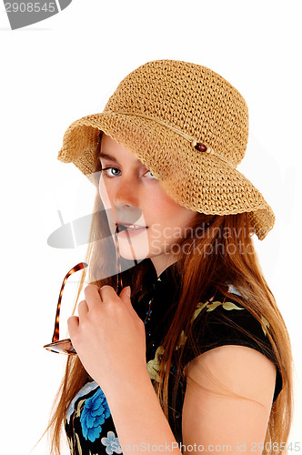 Image of Woman with straw hat.