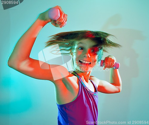 Image of child exercising with dumbells