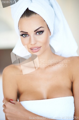 Image of Portrait of Woman Wearing White Bath Towel