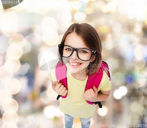 Image of happy smiling teenage girl in eyeglasses with bag