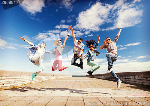 Image of group of teenagers jumping