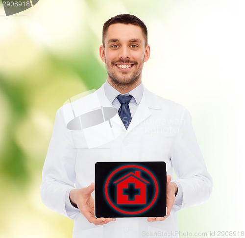 Image of smiling male doctor with tablet pc