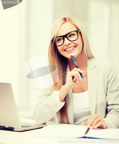 Image of businesswoman with documents