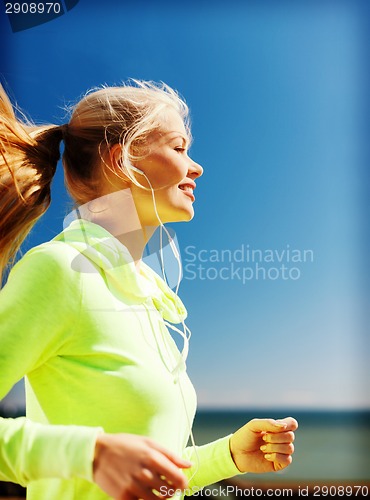Image of woman doing running outdoors