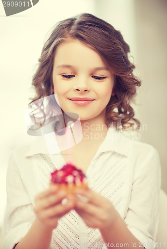 Image of girl with cupcake