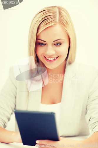 Image of smiling student girl with tablet pc