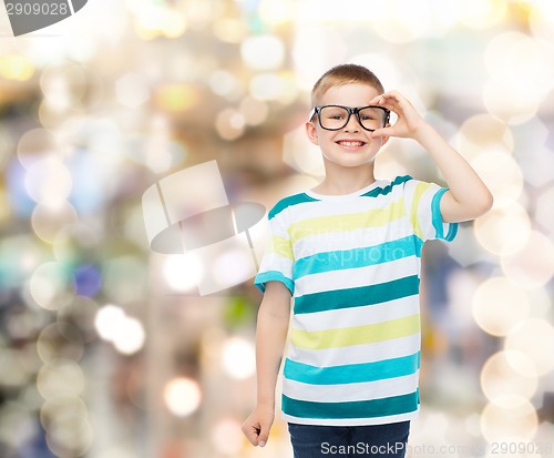 Image of smiling little boy in eyeglasses