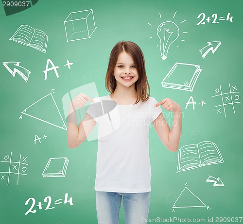 Image of smiling little girl in white blank t-shirt