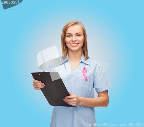 Image of female nurse with stethoscope and clipboard
