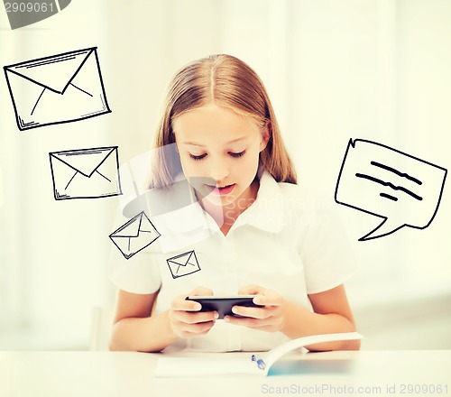 Image of girl with smartphone at school