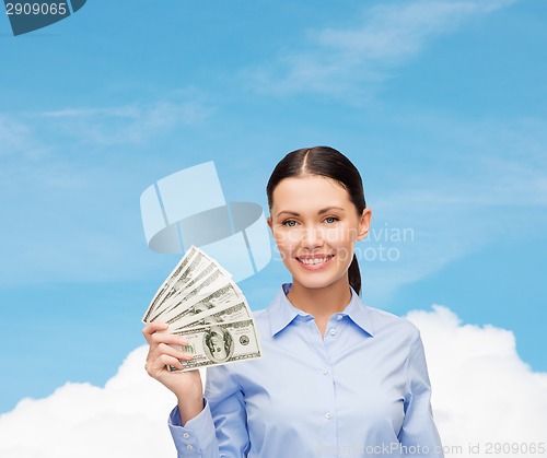 Image of businesswoman with dollar cash money