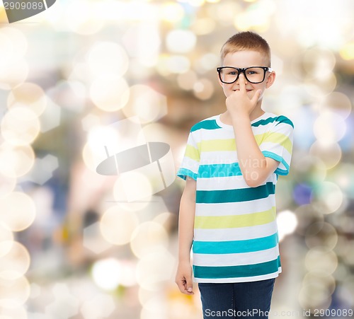 Image of smiling little boy in eyeglasses