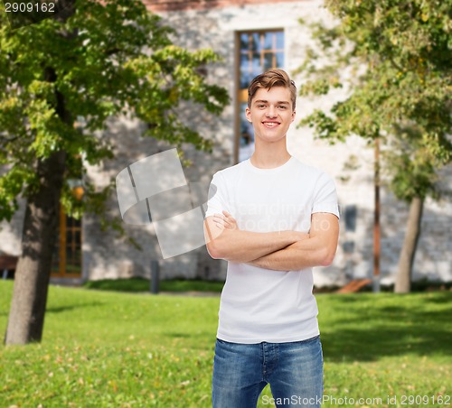 Image of smiling young man in blank white t-shirt