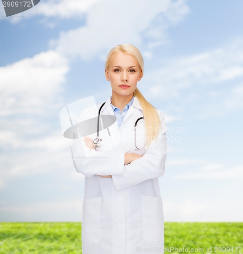 Image of serious female doctor with stethoscope