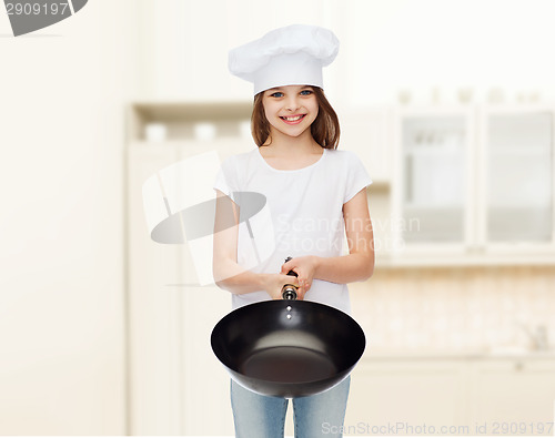Image of smiling little girl in white blank t-shirt