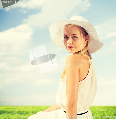 Image of beautiful woman enjoying summer outdoors