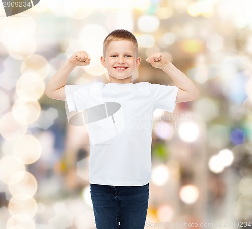 Image of smiling little boy in white blank t-shirt