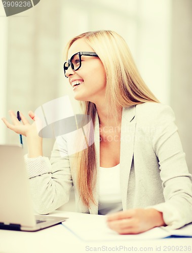 Image of businesswoman with documents