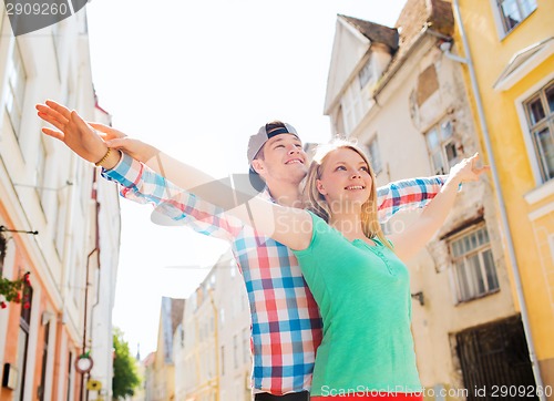 Image of smiling couple in city