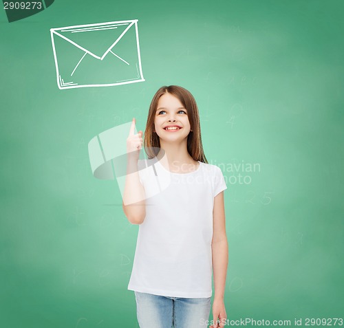 Image of smiling little girl in white blank t-shirt