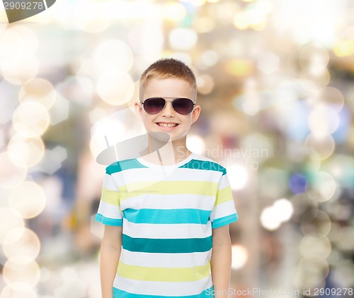 Image of smiling cute little boy in sunglasses