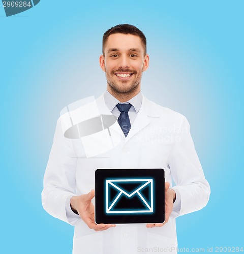 Image of smiling male doctor with tablet pc