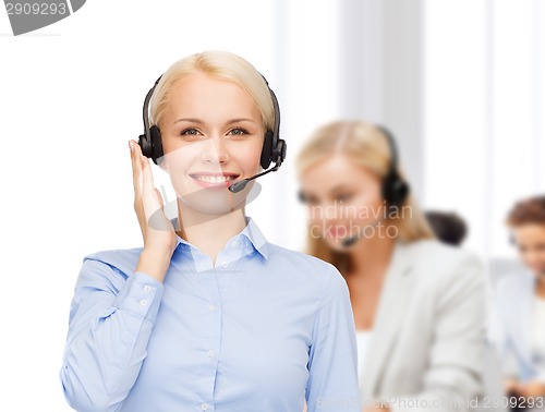 Image of friendly female helpline operator