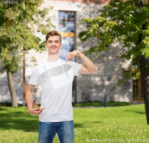 Image of smiling young man in blank white t-shirt