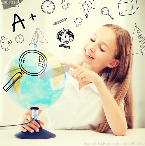 Image of student girl with globe at school