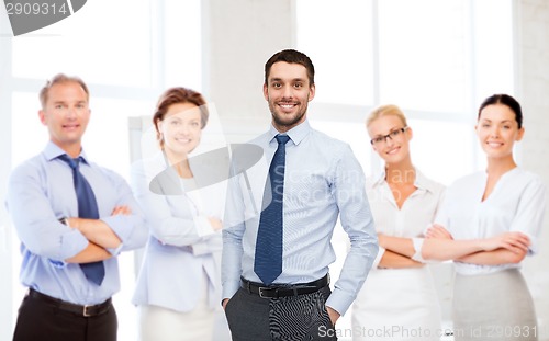 Image of group of smiling businessmen