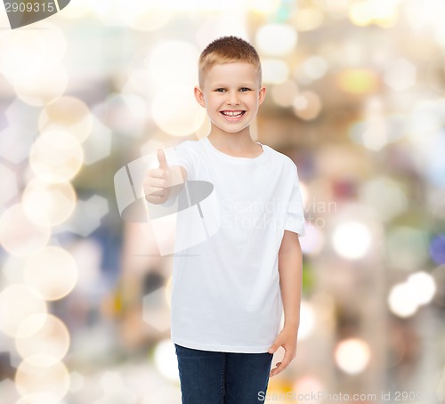 Image of smiling little boy in white blank t-shirt