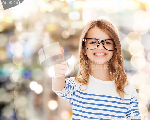 Image of little girl with black eyeglasses