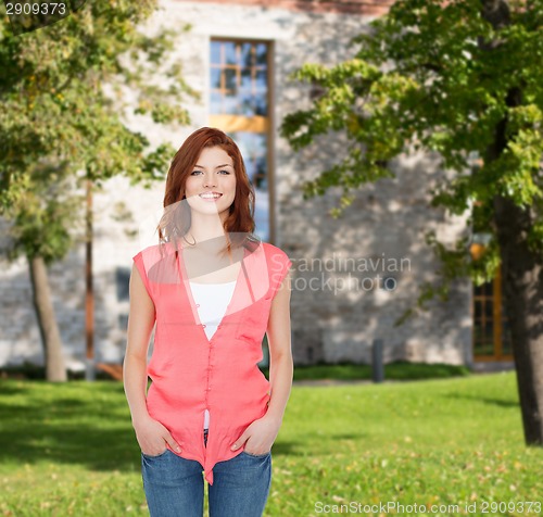 Image of smiling teenage girl in casual clothes