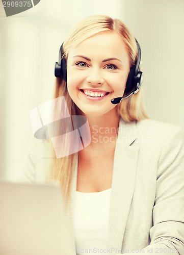 Image of friendly female helpline operator