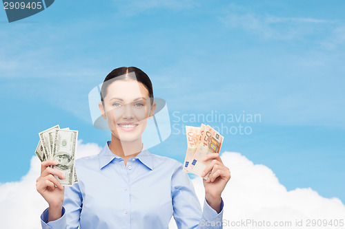 Image of businesswoman with dollar cash money