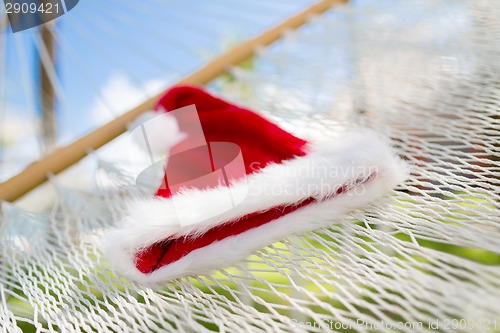 Image of picture of hammock with santa helper hat