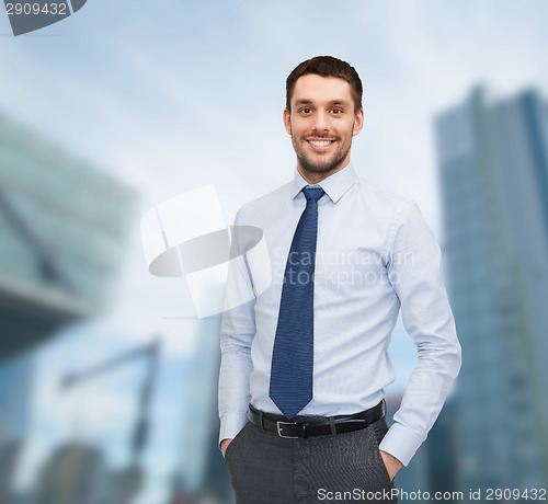 Image of smiling young and handsome businessman