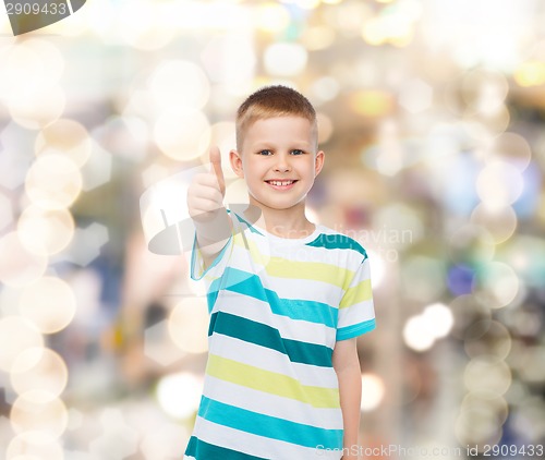 Image of little boy in casual clothes with arms crossed