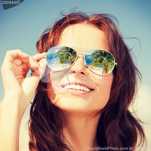 Image of woman in sunglasses