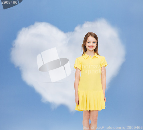 Image of smiling little girl in yellow dress