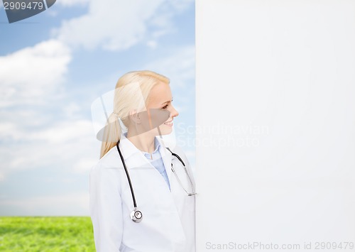 Image of smiling female doctor with stethoscope