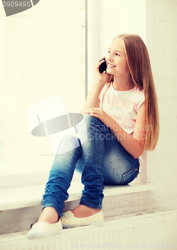 Image of girl with smartphone at school