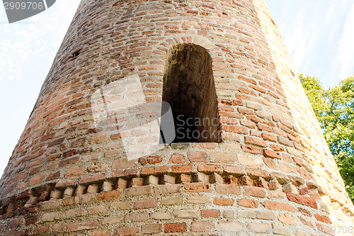 Image of Romanesque cylindrical bell tower of countryside church