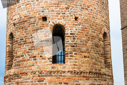 Image of Romanesque cylindrical bell tower of countryside church