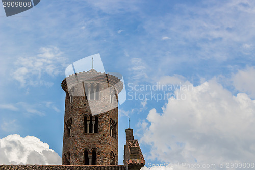 Image of Romanesque cylindrical bell tower of countryside church