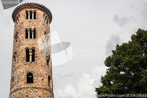 Image of Romanesque cylindrical bell tower of countryside church